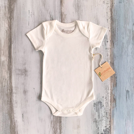 Body Bebé Manga Corta Algodón Orgánico EcoWhite, ideal para piel sensible.