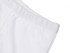 Detalle pantalón con pie bebé blanco algodón orgánico — pretina | Ecobebé