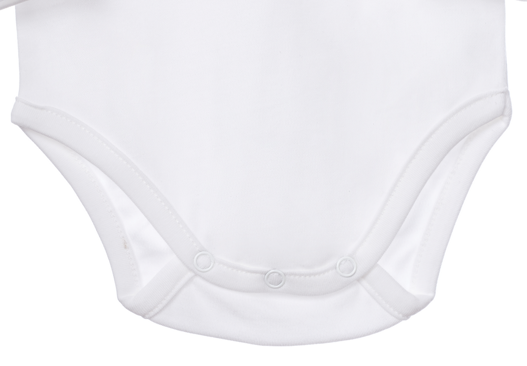 Detalle body bebé blanco en algodón orgánico pima peruano | Ecobebé