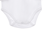 Detalle body bebé blanco en algodón orgánico pima peruano | Ecobebé